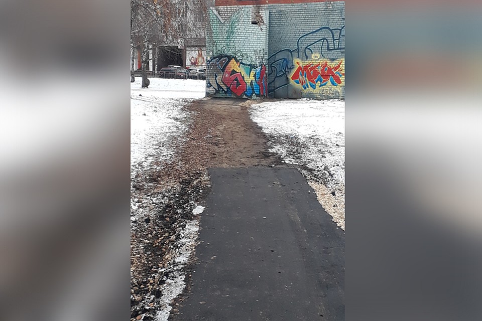 Благоустройство по-нижегородски: дорожку перед котельной заасфальтировали частями