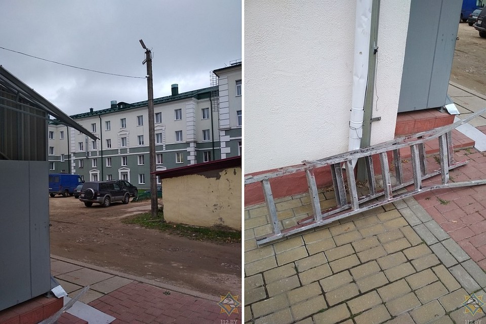 Пенсионер выполнял работы на железобетонном столбе, но оступился и повис. Фото: МЧС.