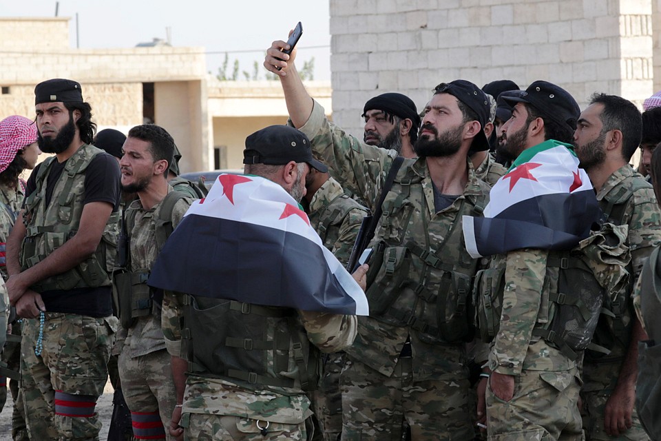 Поддерживаемые турцией сирийские боевики-повстанцы захватили поселение Ябиса на севере Сирии. Фото: REUTERS