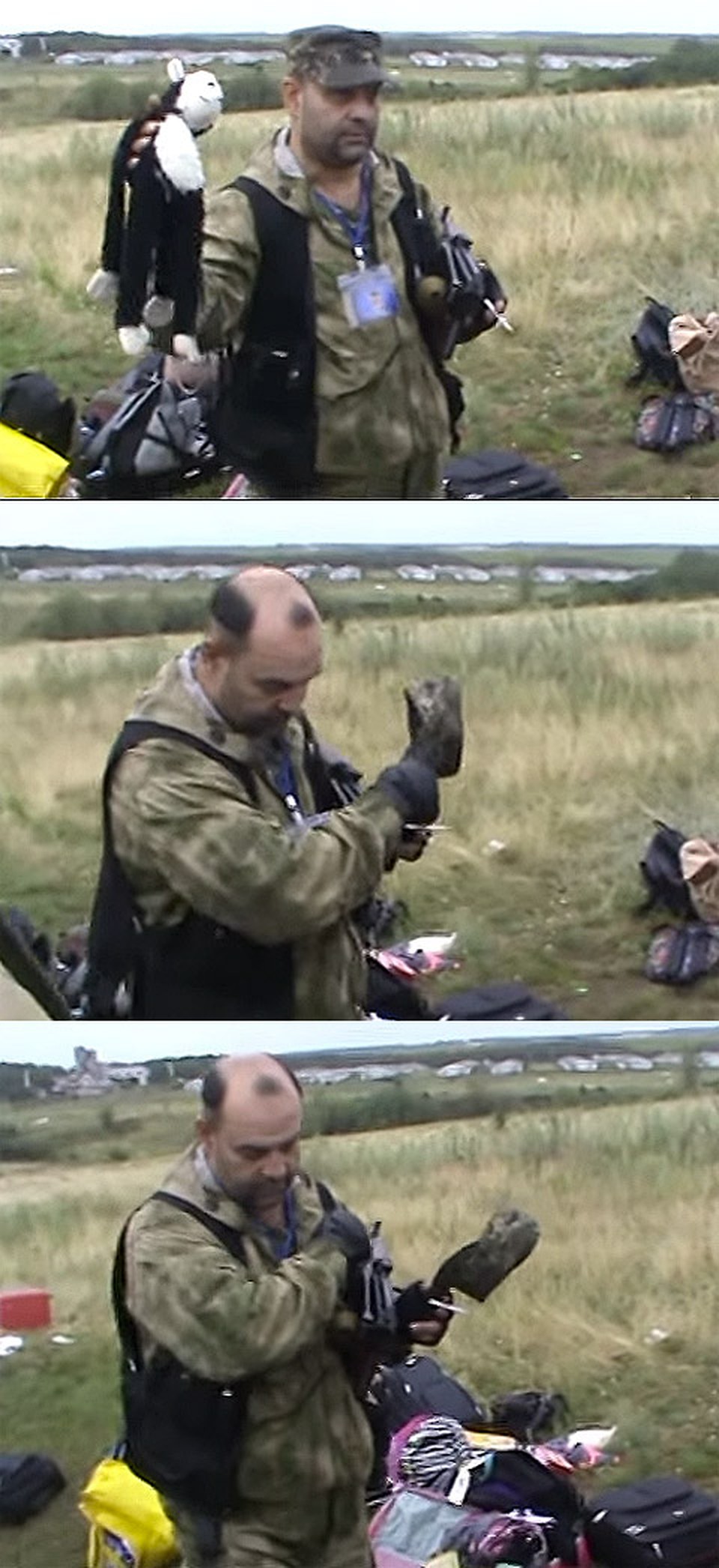 Кадры из видео, в котором ополченец крестится, вспоминая жертв трагедии