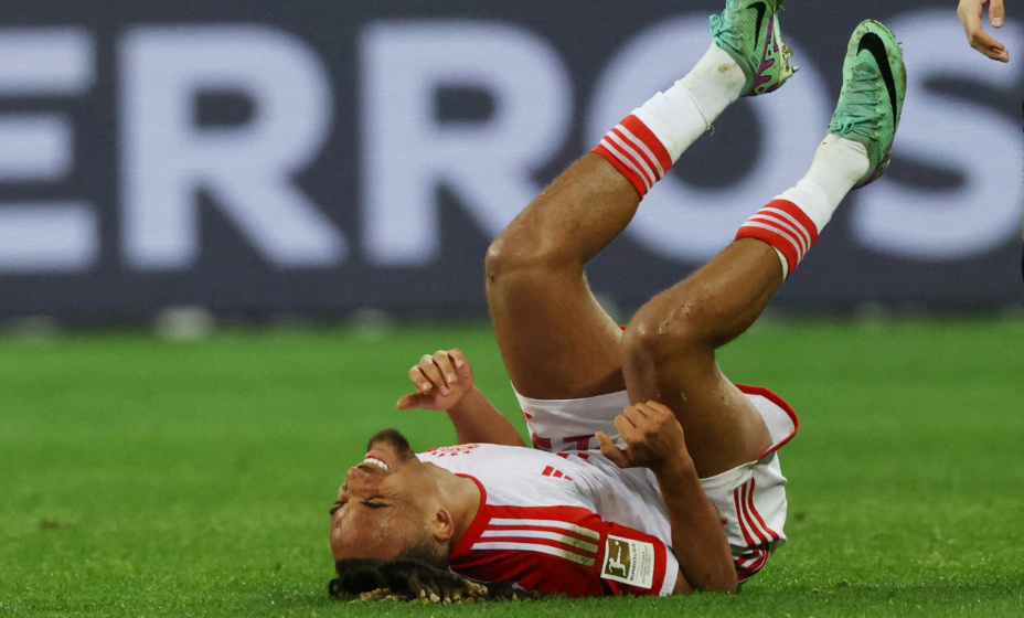 FILE PHOTO: Soccer Football - Bundesliga - Bayer Leverkusen v Bayern Munich - BayArena, Leverkusen, Germany - February 10, 2024
Bayern Munich's Sacha Boey reacts after sustaining an injury REUTERS/Thilo Schmuelgen DFL REGULATIONS PROHIBIT ANY USE OF PHOTOGRAPHS AS IMAGE SEQUENCES AND/OR QUASI-VIDEO./File Photo